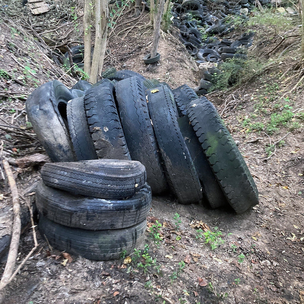 A stack of old tires at the Fort Worth Nature Center & Refuge